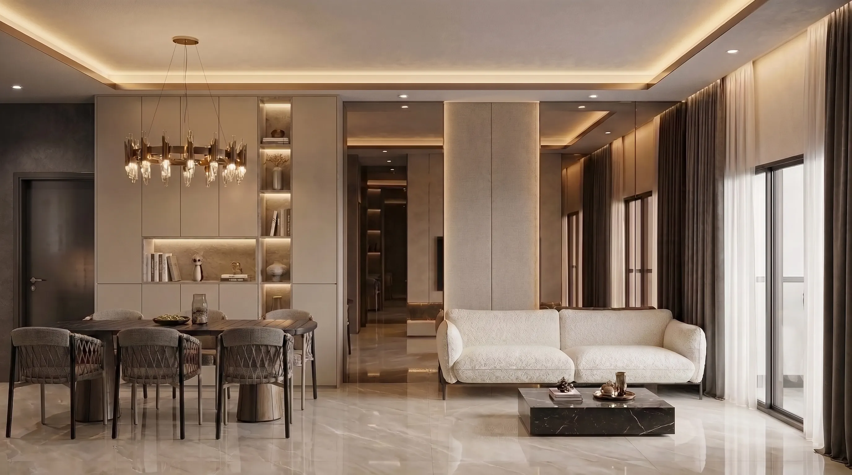 Living and dining room with a marble floor, cove lighting and a brass chandelier
